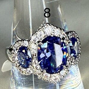 Bomb Party Tanzanite CZ on Rhodium 
Size 8